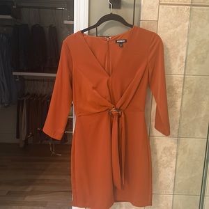Express orange dress with tiger belt loop never worn